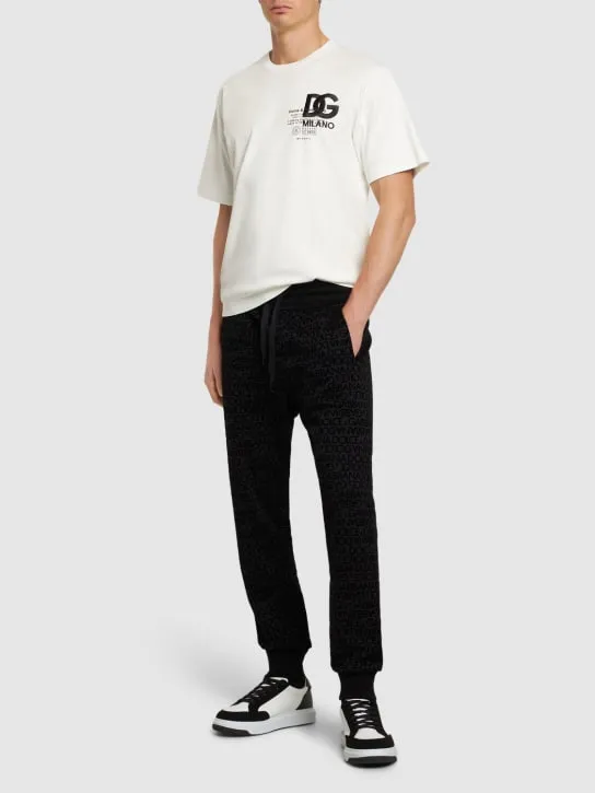 Dolce&amp;Gabbana   Flocked logo cotton jersey sweatpants 