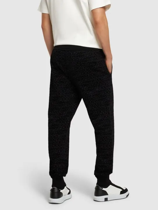 Dolce&amp;Gabbana   Flocked logo cotton jersey sweatpants 