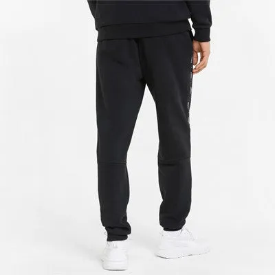 Puma pantalone in felpa con banda laterale e polsino al fondo ESS  Tape Sweatpants FL cl 849042 01 black